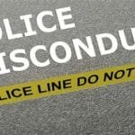 Image of police tape beneath words reading 'police misconduct"